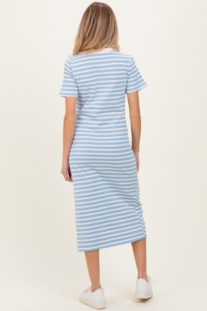 woman wearing a light blue and white striped maternity dress with short sleeves and a midi length, showing the back view