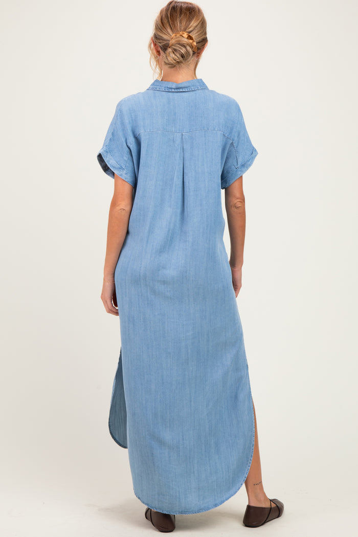 woman wearing a light blue maternity maxi shirt dress with short sleeves and side slits