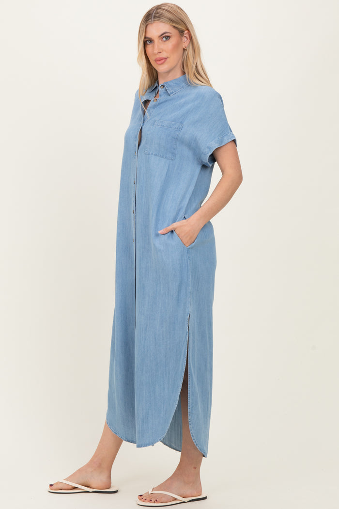 woman wearing a light blue denim maxi shirt dress with short sleeves and side pockets
