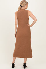 woman wearing a tan ribbed knit sleeveless midi dress, shown from the back