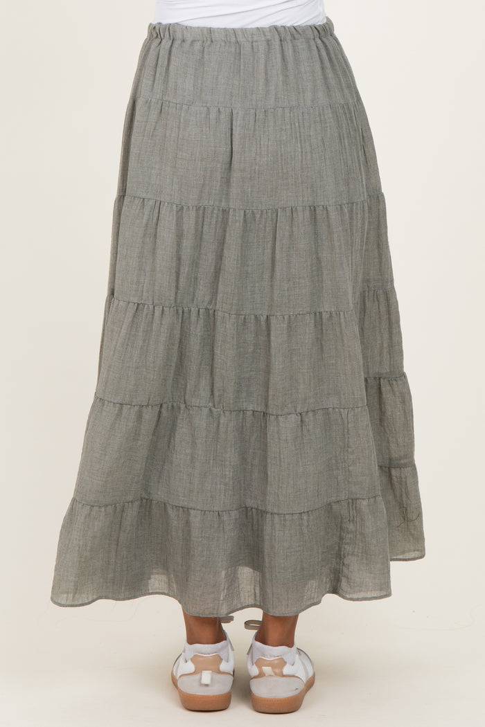 woman wearing a long gray tiered maxi skirt, showcasing a relaxed fit and flowy style, maternity wear
