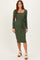woman wearing a long sleeve olive green ribbed midi dress with a square neckline and a tied waist detail