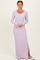 woman wearing a light lavender long sleeve maxi dress with a scoop neck and side slit