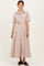 woman wearing a beige striped maternity dress with short sleeves, button front, and a waist tie