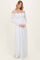 woman wearing a white off-the-shoulder long sleeve lace maxi dress