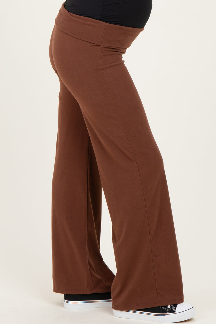 maternity wear brown wide-leg pants with a stretchy waistband and a visible baby bump
