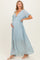 woman wearing a light blue maxi maternity dress with flutter sleeves and a baby bump