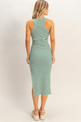 woman wearing a green and white striped sleeveless midi dress, seen from the back