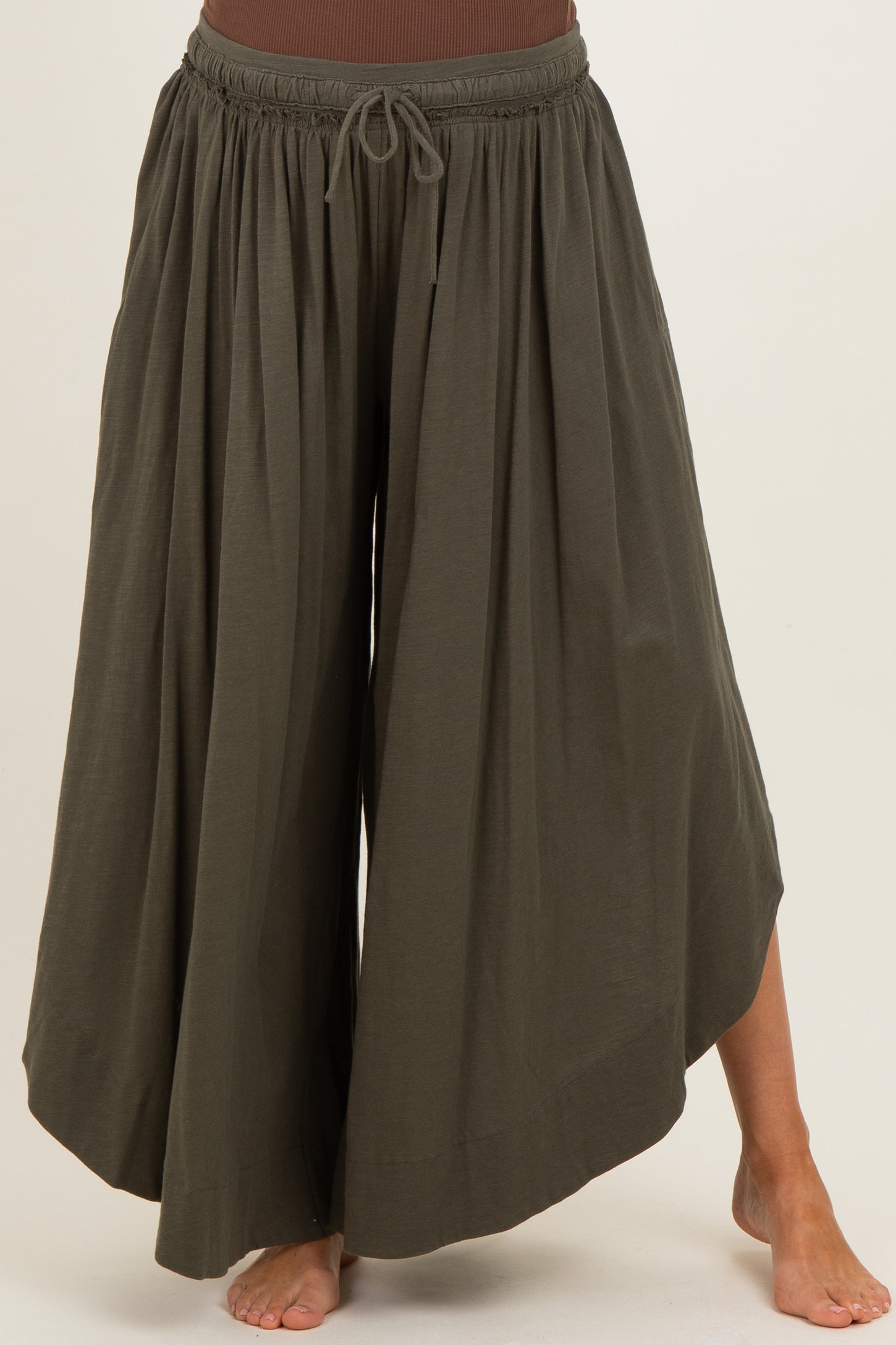 maternity wear olive green wide-leg pants with an elastic waistband and drawstring detail, shown on a model