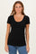 woman wearing a black short sleeve scoop neck top with a fitted style and a natural look