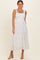 woman wearing a white floral midi dress with adjustable straps and a fitted bodice