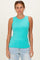 woman wearing a turquoise sleeveless ribbed tank top and light blue jeans