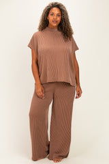 woman wearing a brown ribbed short sleeve top and matching wide-leg pants in plus size