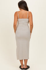 woman wearing a striped maternity maxi dress with spaghetti straps, showing a relaxed fit from the back