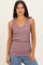 woman wearing a mauve sleeveless v-neck ribbed tank top