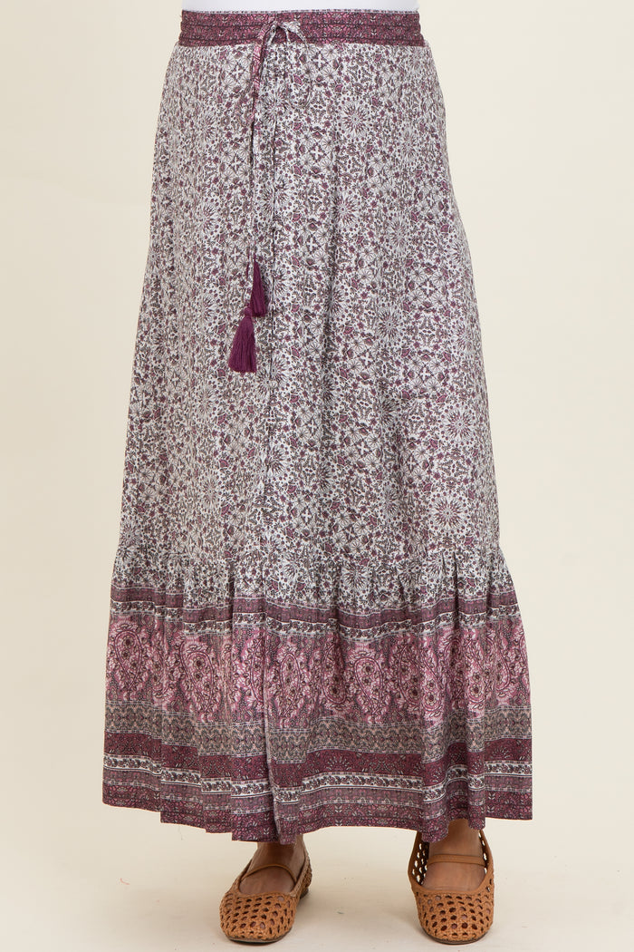 maternity wear long purple and white patterned skirt with a drawstring waist and tassel detail, model not shown