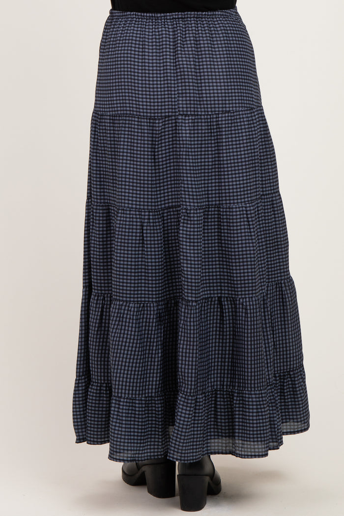 maternity wear navy blue gingham tiered maxi skirt with a ruffled hem, shown from the back