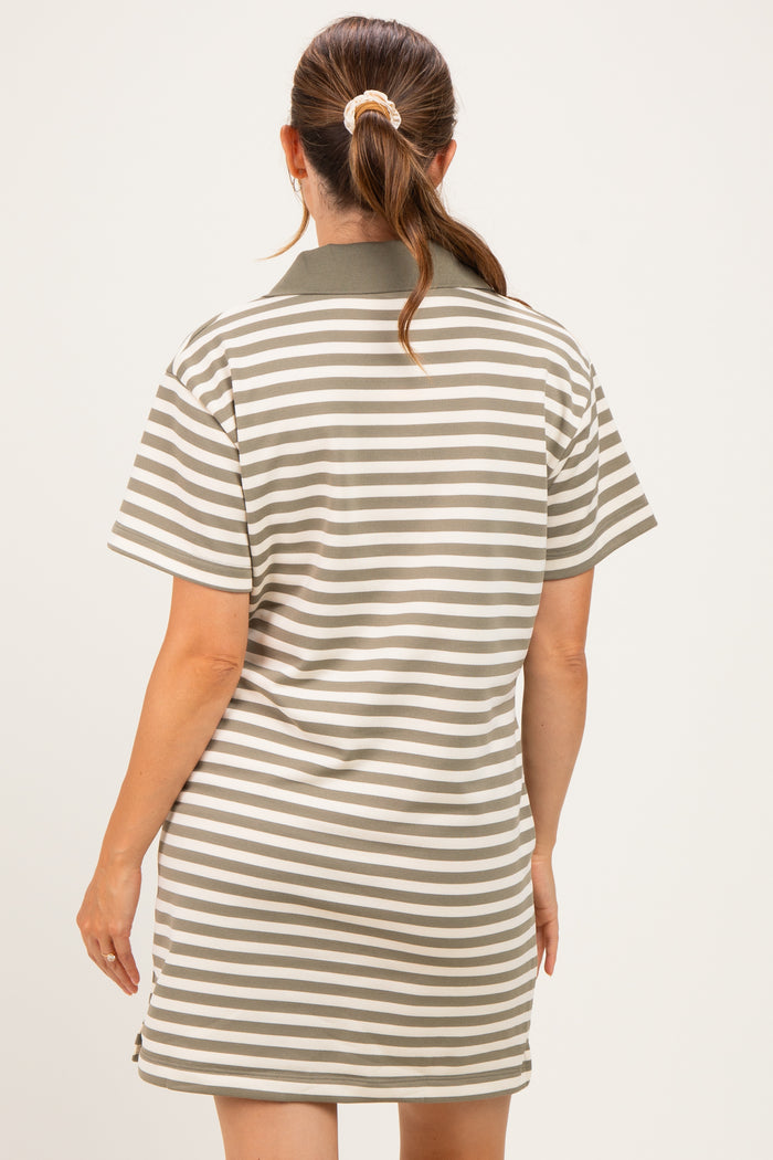 woman wearing a striped maternity polo dress in green and white, shown from the back