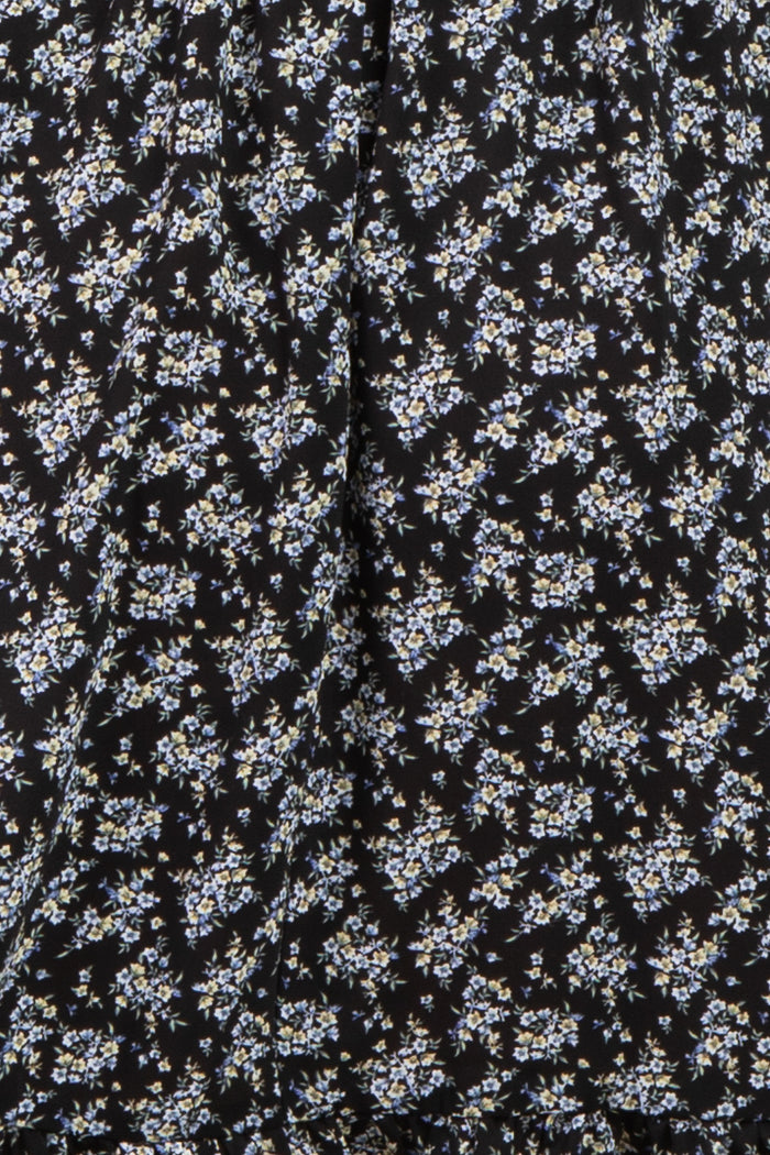 black floral maternity dress with small blue and white flowers