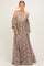 woman wearing a taupe off-the-shoulder lace maxi dress with long, puffed sleeves