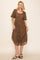 woman wearing a brown lace midi dress with short sleeves and a square neckline