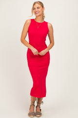 woman wearing a fitted red midi dress with side ruching and a scoop neckline