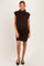 woman wearing a brown short sleeve knitted maternity dress with a stylish scarf detail and visible baby bump