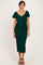 woman wearing a dark green midi dress with puff sleeves and a ruched design