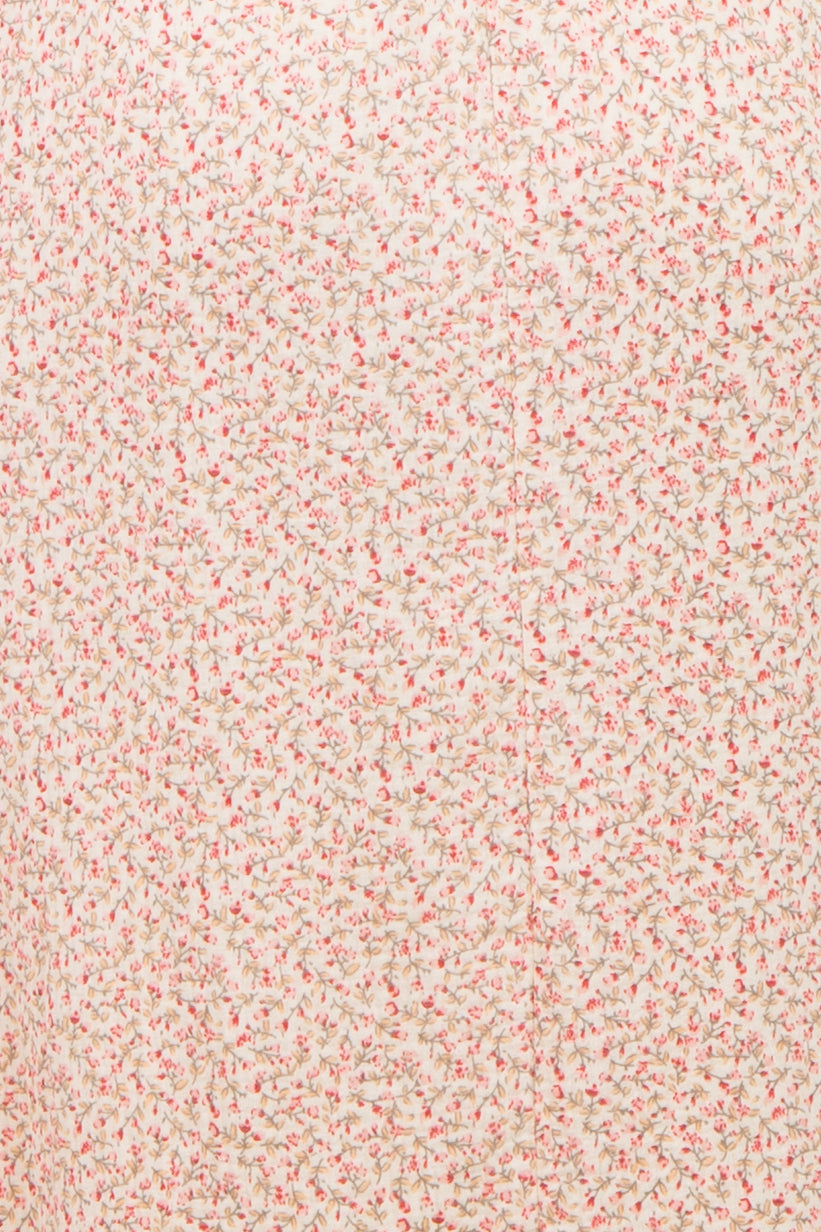 maternity wear in light pink floral printed fabric with small flowers throughout