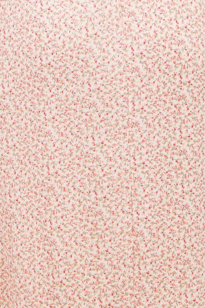 maternity wear in light pink floral printed fabric with small flowers throughout