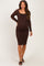 woman wearing a brown lace maternity dress with long sleeves and a fitted silhouette, showcasing her baby bump