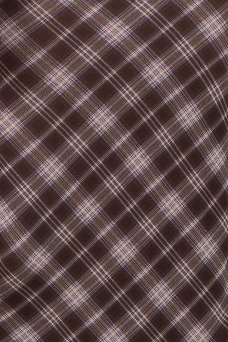 brown plaid fabric with diagonal lines and light purple accents
