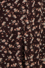 maternity wear in a dark brown floral print with pink and cream flowers and a soft flowy fabric