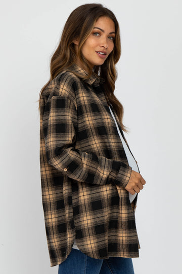woman wearing a tan and black plaid maternity shirt with a relaxed fit and a visible baby bump