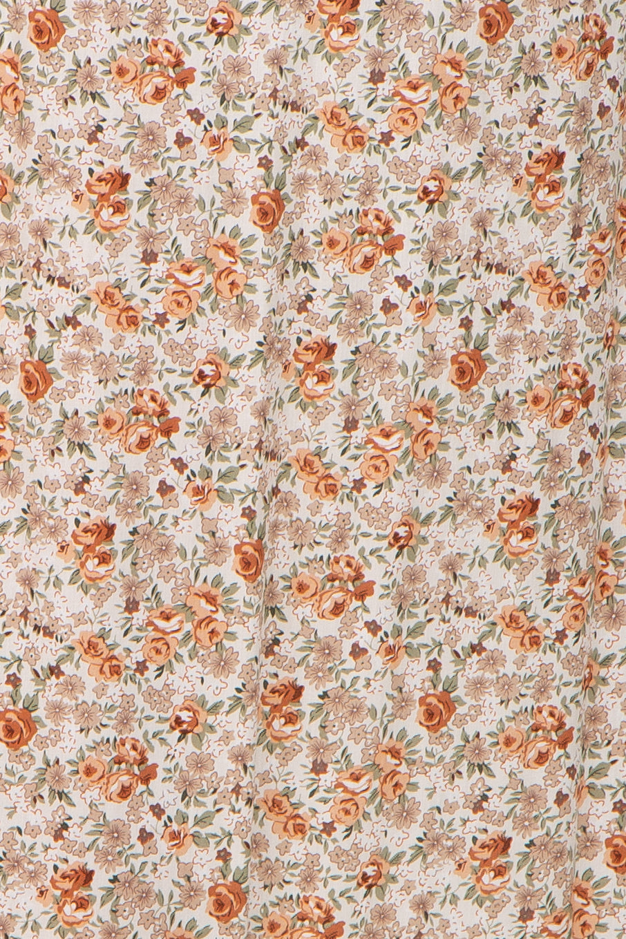maternity wear floral fabric with orange and beige roses on a light background