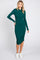 woman wearing a green long sleeve midi dress with ruched side detailing and white sneakers