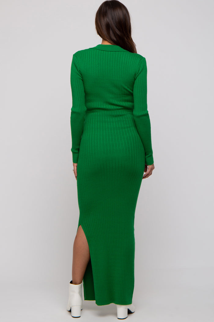 woman wearing a long sleeve green ribbed maternity dress with a side slit, showing her baby bump from the back