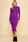 woman wearing a fitted purple long sleeve midi dress with a scoop neck and side ruching, paired with black ankle boots