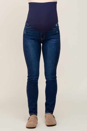 maternity skinny jeans in dark wash blue with over the belly support panel and tan shoes